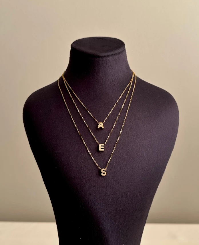 Çelik gold harf taşlı kolye