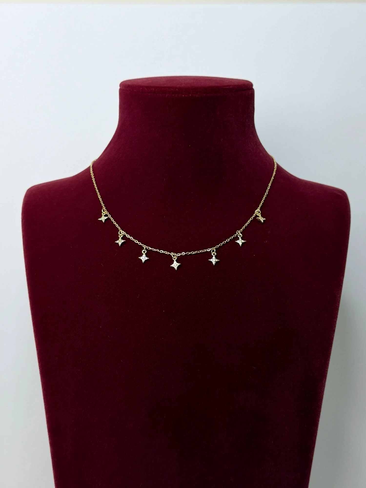 çelik gold yıldız charm kolye